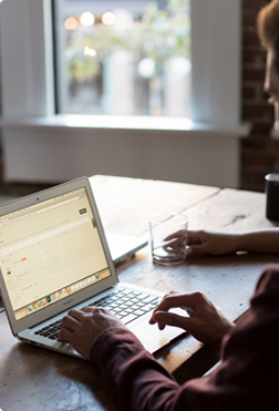 working-with-laptop POS software interface displaying stock tracking